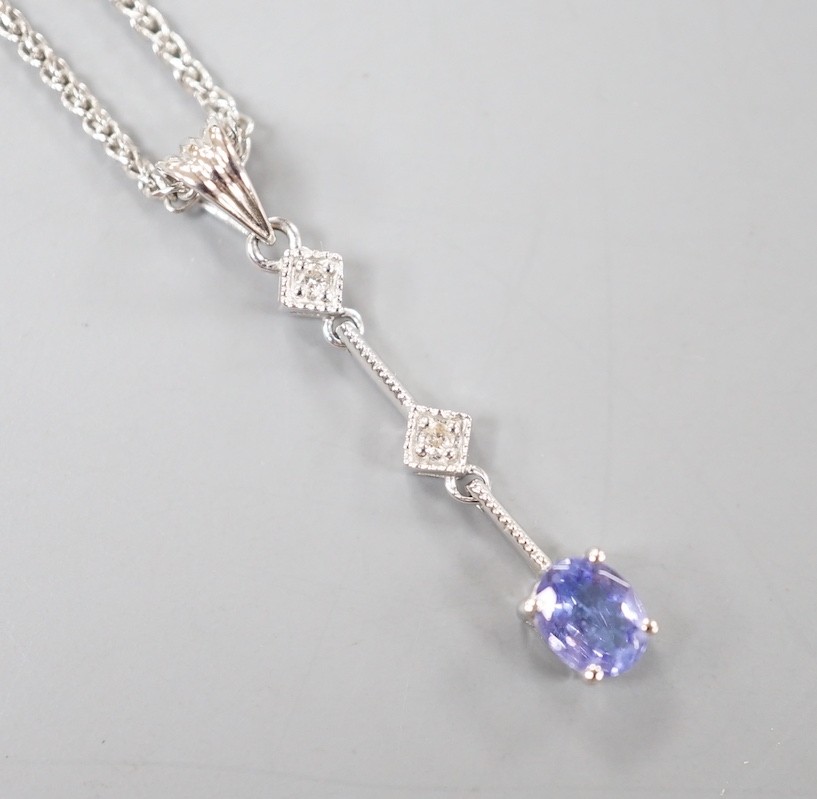A modern Italian 705 white metal tanzanite and diamond set three stone pendant necklace, 48cm, gross weight 4 grams.